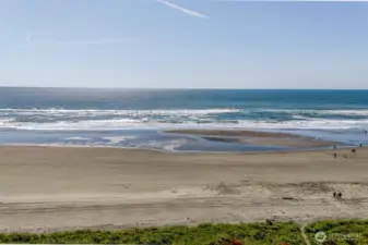 Steps away from the beach down the neighborhood deeded access trail.