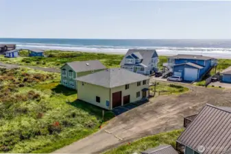 Ariel view of residence and proximity to the ocean.