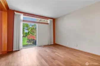 Large patio door w/transom lets in the light