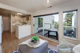 Living area w/access to first deck