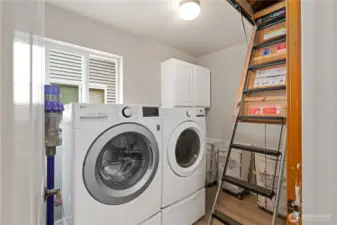 Simply pull down the string and a HUGE attic storage area opens for your pleasure!