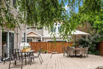 Enjoy a backyard deck perfect for summer gatherings and morning coffee.