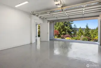 Newly Epoxied Garage Floor -this is the 2-car garage space. An additional 1-car garage with epoxied floor is to the left.