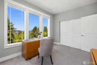 Imagine quilting with a lovely territorial and water view outlook.  See the large closets also.