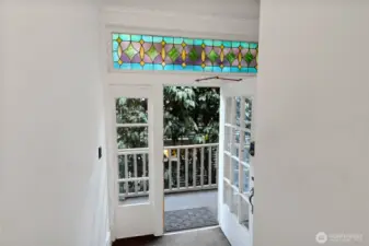 Stained glass details reflect timeless charm. 2 level entrance.