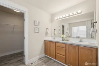Primary off-suite bathroom with large walk in closet!