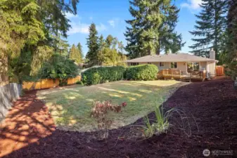 Spacious fully fenced back yard.