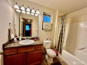 Upstairs bathroom with granite countertops