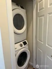 Thelaundry area is above the main living area and close to the bedrooms.