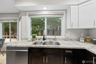 Prepping meal or washing dishes is so relaxing looking at the wraparound deck.