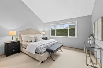 Primary retreat looks out to green trees.