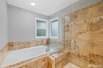 Spa inspired soaking tub and shower.