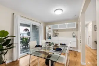 Bright dining area, just off of the kitchen with optional lit cabinet!