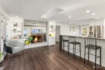 Eating bar and fireplace by the kitchen