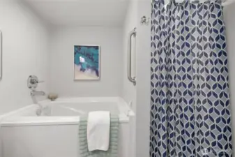 Look at that soaker tub!! Shower behind the curtain