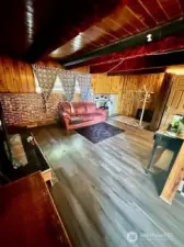 family room downstairs with fireplace