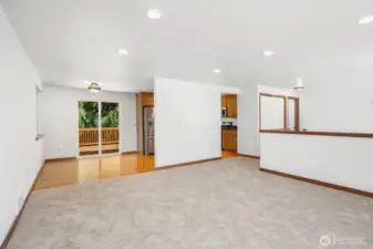 Living Room looking towards Kitchen/Dining/Deck access