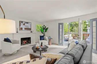 Spacious living area opens to deck and landscaped yard.