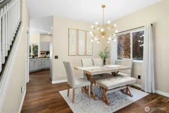 The formal dining room is accented with a window to let in the natural light.