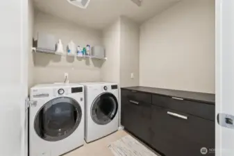 Laundry room with built in cabinet