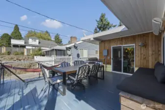 Enjoy indoor-outdoor living on the large deck off the kitchen