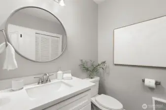 There is a 1/2 bath on main floor with laundry.
