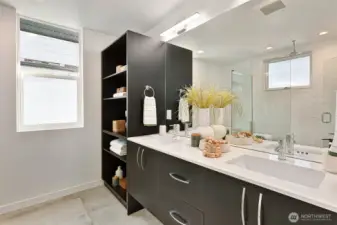 Primary bath includes double vanity and lots of storage.