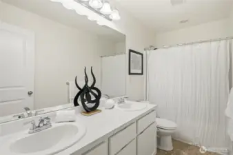 Hall bathroom serves additional bedrooms