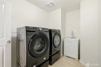 Convenient upstairs laundry with utilities sink