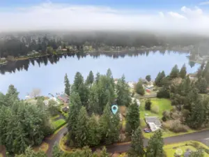 From above you can see exactly where this home sits, directly across from Pattison Lake and surrounded by well cared for waterfront properties. There’s something nice about a neighborhood where people tend to invest in their surroundings, it shows up in how everything looks and feels day to day. You get the scenery and atmosphere without the shoreline upkeep, and when you want the water, the public boat launch is only about five minutes away.