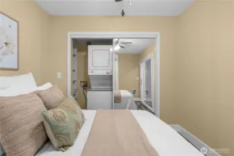 Bedroom looking towards closet and laundry