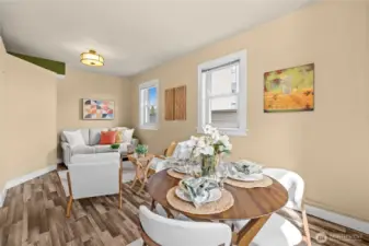 Looking from breakfast bar area into dining and living area