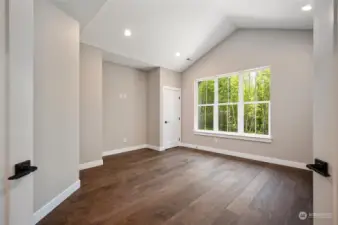 One of 3 upstairs bedrooms, this one has french doors so could also be a TV or rec room.