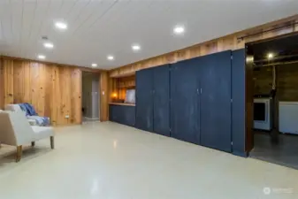 Bonus room in basement with built-ins.