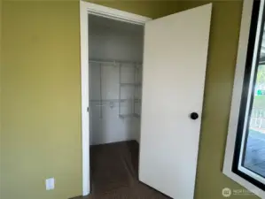 The primary bedroom's walk-in closet.