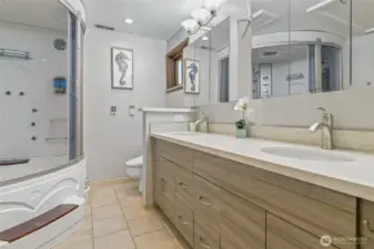 Spacious Spa-Like Primary Bath with Double Sinks, Tons of Storage,, Heated Floors and Towel Rack.