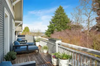 2nd floor balcony offers quiet views of Lake Washington and Mt. Baker