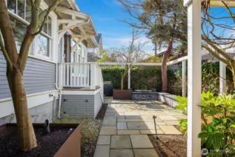 Once outside this perfectly sized backyard garden is great for hosting summer dinners.