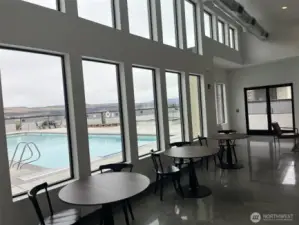 Inside sitting with gorgeous view of the pool and river