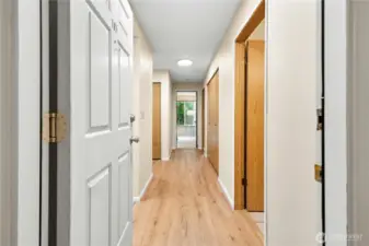 Vinyl plank flooring in main living area and entry hall.