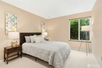 2nd bedroom looking into private backyard.