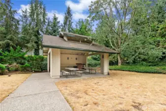 Community pavilion in parklike setting.