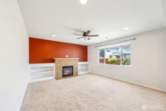 Large great room with gas fireplace and built ins