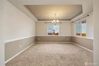 Formal dining room off entry