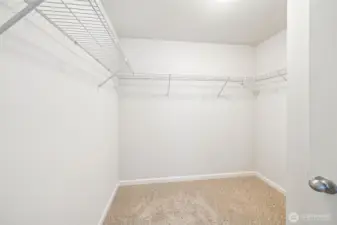 One of two walk in closets in the primary