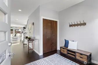 The entry invites you right in! Gleaming hardwood floors and freshly painted!