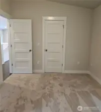Main level primary wit door to shared bath