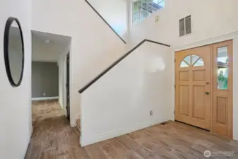 Fresh paint and gorgeous handscraped wood-look tile throughout the main floor makes this home move-in ready!