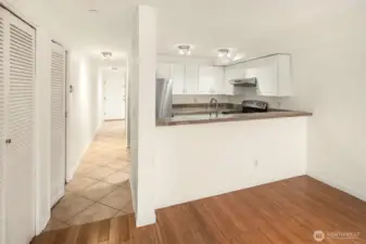 The closets along the left all house the full size washer/dryer and provide pantry space.