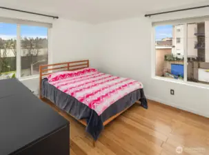 The bedroom is spacious with great light.